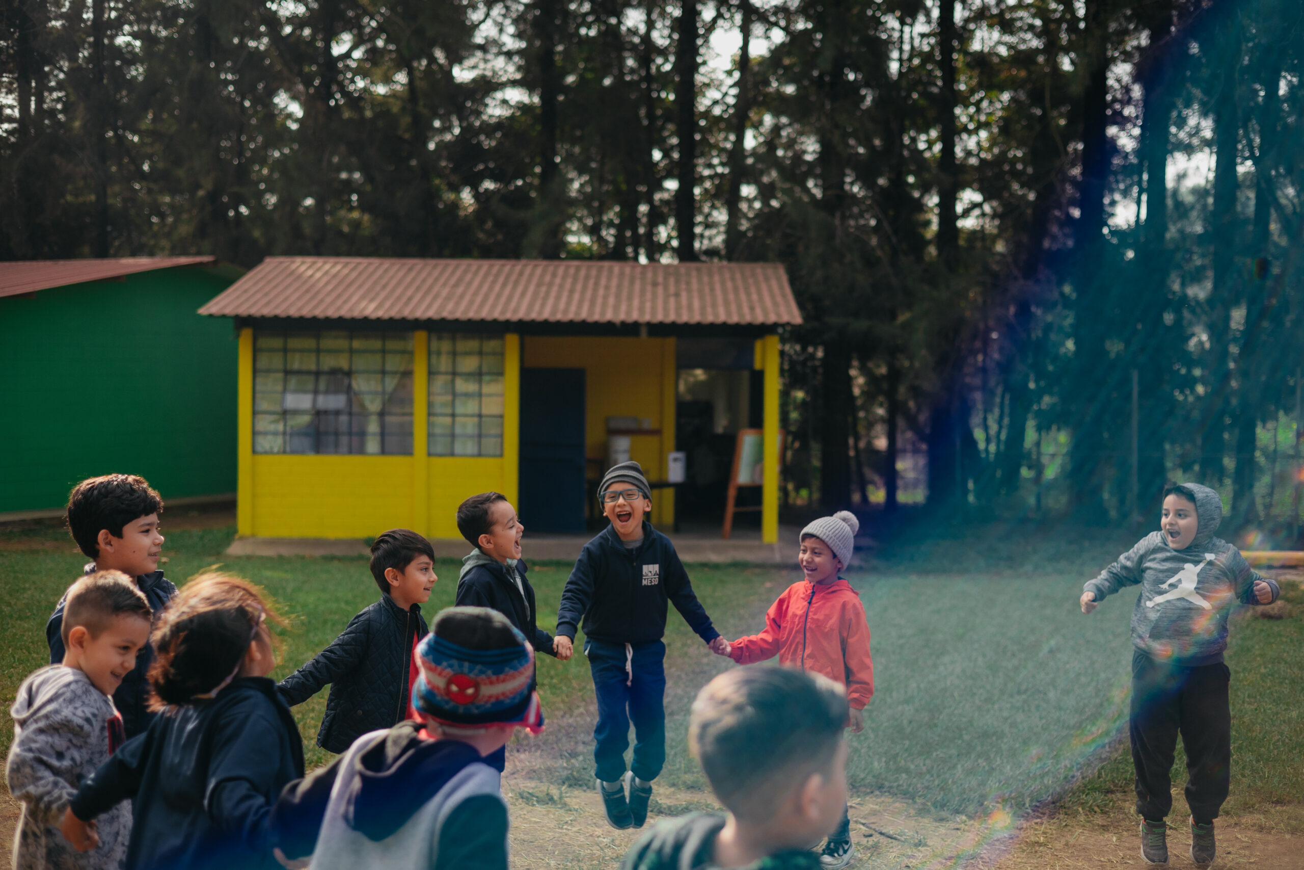 Kids in a circle holding hands